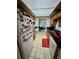 Galley kitchen with ample counter space and white appliances at 6110 Peregrine Ave # E05, Orlando, FL 32819
