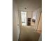 Hallway with access to bedrooms and bathroom at 6110 Peregrine Ave # E05, Orlando, FL 32819