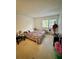 Spacious bedroom with double bed and window at 6110 Peregrine Ave # E05, Orlando, FL 32819