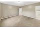Spacious bedroom with carpet and an ensuite bathroom at 1048 Universal Rest Pl, Kissimmee, FL 34744