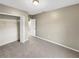 Simple bedroom with carpeted floor and a large closet at 1048 Universal Rest Pl, Kissimmee, FL 34744