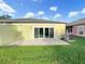 Private patio with access to backyard at 1048 Universal Rest Pl, Kissimmee, FL 34744