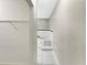 Bathroom with a corner bathtub and closet at 1048 Universal Rest Pl, Kissimmee, FL 34744