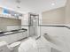 Elegant bathroom with a double vanity and soaking tub at 1048 Universal Rest Pl, Kissimmee, FL 34744
