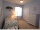 Cozy bedroom with a twin bed, dresser, and ample closet space at 3235 Bellingham Dr, Orlando, FL 32825