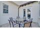 Small patio with round table and six chairs at 15716 Panther Lake Dr, Winter Garden, FL 34787