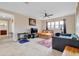 Spacious bonus room with TV, couch, and plenty of natural light at 15716 Panther Lake Dr, Winter Garden, FL 34787