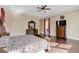 Large main bedroom with a king-size bed and access to the patio at 15716 Panther Lake Dr, Winter Garden, FL 34787