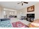Spacious bonus room with two couches and a TV at 15716 Panther Lake Dr, Winter Garden, FL 34787