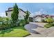 Luxury home with manicured landscaping and driveway at 15716 Panther Lake Dr, Winter Garden, FL 34787