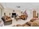 Open concept living room with a view of the kitchen and entryway at 15716 Panther Lake Dr, Winter Garden, FL 34787