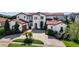 Mediterranean style home with tile roof and driveway at 15716 Panther Lake Dr, Winter Garden, FL 34787