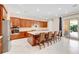 Spacious kitchen with island, stainless steel appliances, and hardwood floors at 15716 Panther Lake Dr, Winter Garden, FL 34787