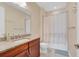 Bathroom with tub shower combination and single vanity at 15716 Panther Lake Dr, Winter Garden, FL 34787