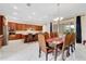 Large kitchen with island, ample cabinetry, and dining area at 15716 Panther Lake Dr, Winter Garden, FL 34787
