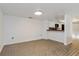 Dining room with kitchen pass-through and tile floor at 1000 Winderley Pl # 7, Maitland, FL 32751