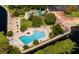 Community pool with surrounding patio area at 1000 Winderley Pl # 7, Maitland, FL 32751