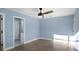 Bedroom with access to bathroom and hardwood floors at 1925 Blossom Ln, Maitland, FL 32751