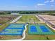 Aerial view showing community basketball and tennis courts at 2749 Flushing Dr, Apopka, FL 32703