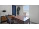 Home office with a large desk and ample natural light at 2753 Flushing Dr, Apopka, FL 32703