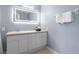 Bathroom with vanity, mirror, and light at 2364 Silver Palm Dr, Kissimmee, FL 34747