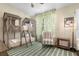 Bedroom with bunk beds, armchair, and reading nook at 2364 Silver Palm Dr, Kissimmee, FL 34747
