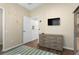 Bedroom with dresser and TV at 2364 Silver Palm Dr, Kissimmee, FL 34747