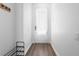 Bright entryway with wood-look flooring and neutral walls at 2364 Silver Palm Dr, Kissimmee, FL 34747