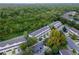 Aerial view of townhouses near a wooded area at 2364 Silver Palm Dr, Kissimmee, FL 34747