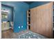Small bathroom with a sink, toilet and shower, adjacent to a bedroom at 2364 Silver Palm Dr, Kissimmee, FL 34747