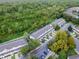 Aerial view of townhomes and surrounding landscape at 2364 Silver Palm Dr, Kissimmee, FL 34747