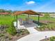 Community mailbox area with covered structure at 1901 Walnut Creek Dr, Kissimmee, FL 34744