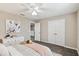 Charming bedroom with a double bed and built-in closet at 5009 Torchwood Dr, Minneola, FL 34715