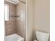 Clean bathroom with a shower/tub combination at 5009 Torchwood Dr, Minneola, FL 34715