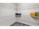 Large walk-in closet with wire shelving and ample storage space at 5009 Torchwood Dr, Minneola, FL 34715