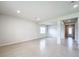Spacious living room with tile floors and access to hallway at 10411 Park Estate Avenue, Orlando, FL 32836