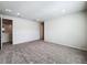 Spacious bedroom with neutral carpeting and doors to closet and hallway at 10411 Park Estate Avenue, Orlando, FL 32836