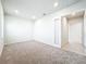 Bright bedroom with neutral carpeting and access to hallway at 10411 Park Estate Avenue, Orlando, FL 32836
