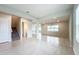 Open concept living room and dining area at 10411 Park Estate Avenue, Orlando, FL 32836