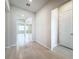 Bright and airy entryway with tile floors and views to living areas at 10411 Park Estate Avenue, Orlando, FL 32836