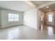 Spacious dining area with tile floors and large window at 10411 Park Estate Avenue, Orlando, FL 32836