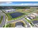 Community overview including houses, pond, and park at 10411 Park Estate Avenue, Orlando, FL 32836