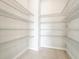 Bright pantry with ample shelving for storage at 10411 Park Estate Avenue, Orlando, FL 32836