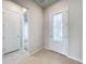 Bright entryway with tile floors and modern doors at 10411 Park Estate Avenue, Orlando, FL 32836