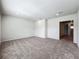 Spacious bedroom with neutral walls and carpeting at 10411 Park Estate Avenue, Orlando, FL 32836