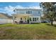 Two-story house with a covered patio and a fenced backyard at 11542 Brightstowe Way, Orlando, FL 32836