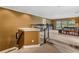 Upstairs landing with carpeting, railing, and view of a library at 11542 Brightstowe Way, Orlando, FL 32836