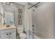 Clean bathroom with a shower/tub combo and updated vanity at 11542 Brightstowe Way, Orlando, FL 32836
