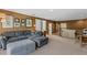 Spacious bonus room with comfortable seating and a desk area at 11542 Brightstowe Way, Orlando, FL 32836