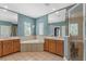 Spacious bathroom with corner soaking tub, dual vanities, and walk-in shower at 11542 Brightstowe Way, Orlando, FL 32836